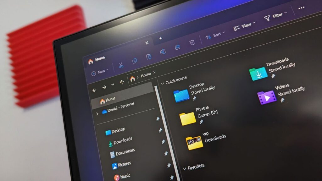 Microsoft is finally updating this decade old File Explorer interface with a new color that better fits dark mode on Windows 11 — let’s take a first look