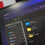 Microsoft is finally updating this decade old File Explorer interface with a new color that better fits dark mode on Windows 11 — let’s take a first look