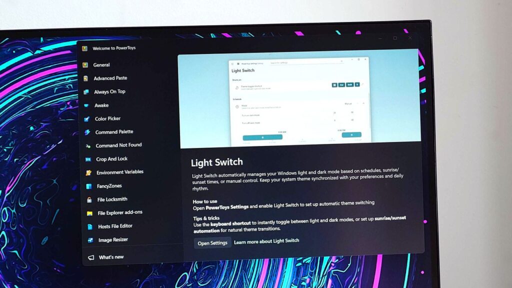PowerToys now lets Windows 11 auto‑switch light and dark modes — as Microsoft works on a consistent dark mode across the OS
