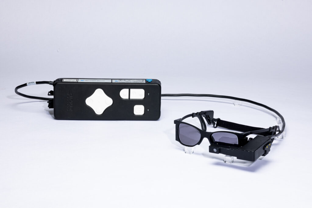 Blind patients read again with smart glasses-linked eye implant