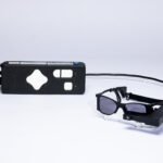 Blind patients read again with smart glasses-linked eye implant