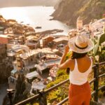 Too burned out to travel? This new app fakes your summer vacation photos for you