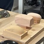 Of all the things I saw behind the curtain at Logitech HQ, it was this slab of fake wood that surprised me the most: ‘It’s kind of old school, it’s analogue, which we like’