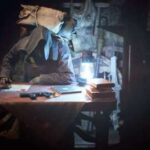 Resident Evil 4 Remake’s Merchant Has Probably Tanked His Credit Score